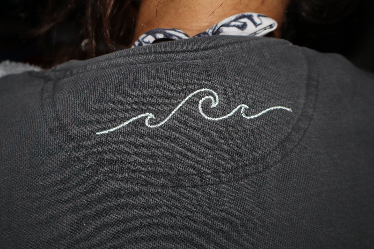 On The Water, a coastal company sweatshirt